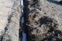 Erdarbeiten Drainage verlegen